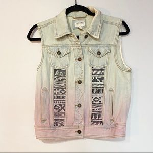 Denim vest with sewn in tribal pattern